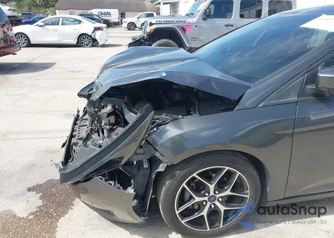 2017 Ford Focus Sel z USA, uszkodzony, nr VIN 1FADP3H2XHL247188